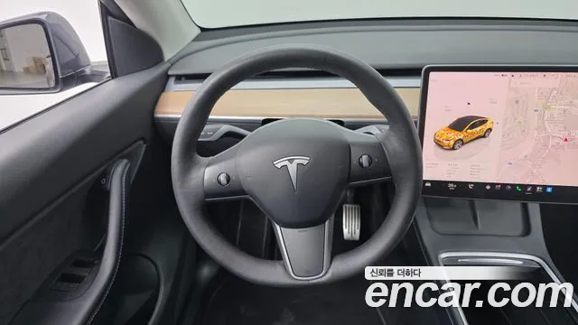 Tesla Model Y — Фото автомобиля 12