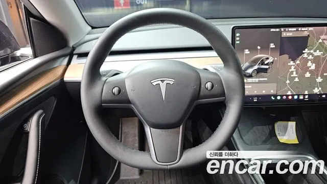 Tesla Model Y — Фото автомобиля 11