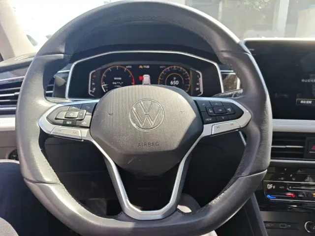 Volkswagen Tiguan L — Фото автомобиля 10