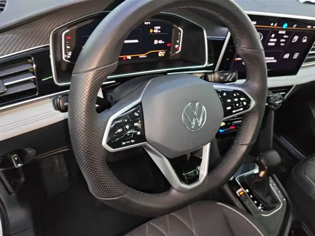 Volkswagen Tiguan L — Фото автомобиля 10