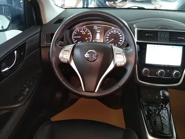 Nissan Tiida — Фото автомобиля 10