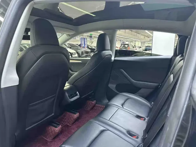 Tesla Model Y — Фото автомобиля 6