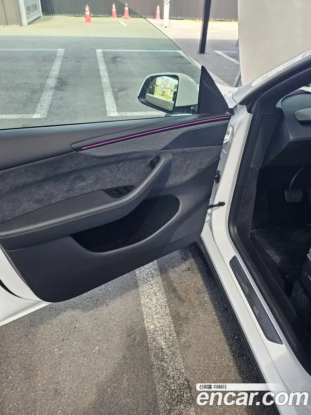Tesla Model Y — Фото автомобиля 14