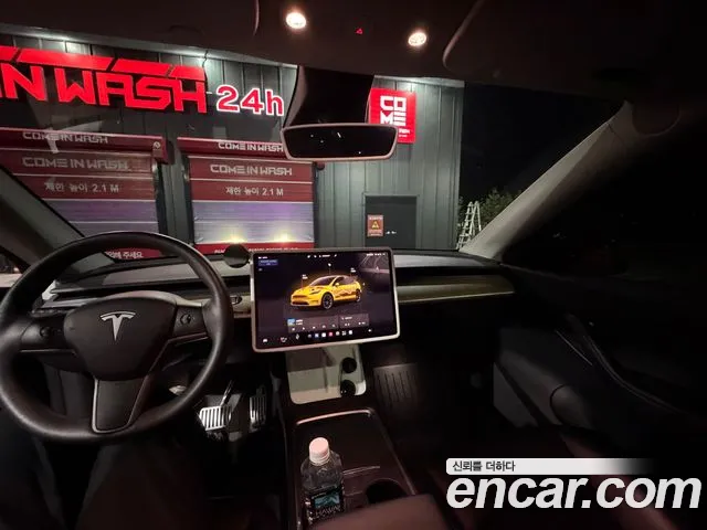 Tesla Model Y — Фото автомобиля 9