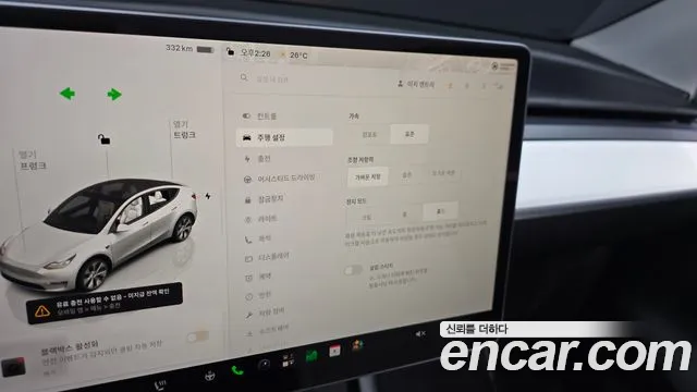Tesla Model Y — Фото автомобиля 23