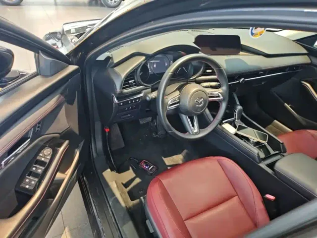 Mazda Axela — Фото автомобиля 15