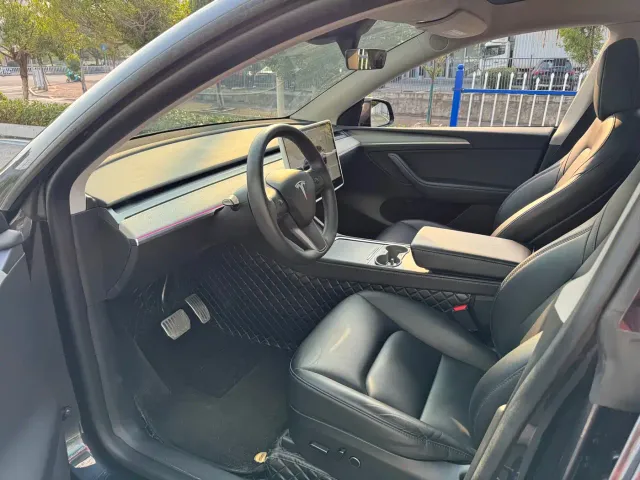 Tesla Model Y — Фото автомобиля 7