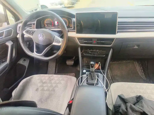 Volkswagen Tiguan L — Фото автомобиля 12