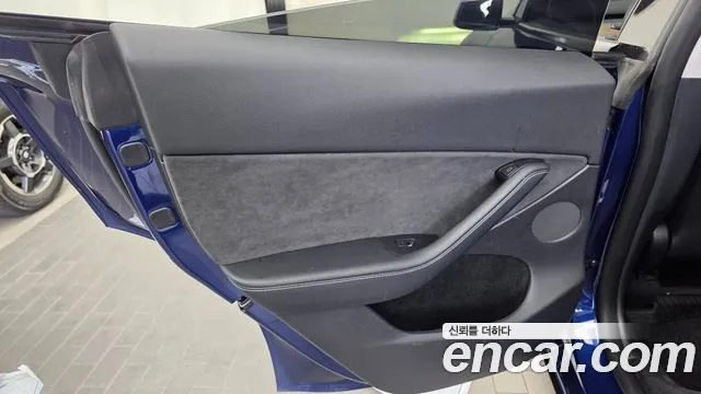 Tesla Model Y — Фото автомобиля 14