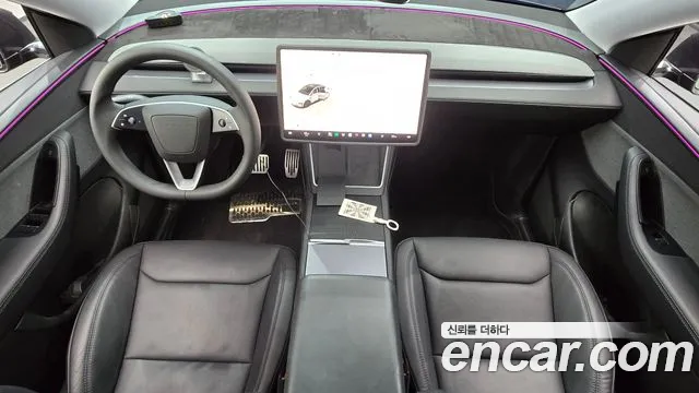 Tesla Model Y — Фото автомобиля 7