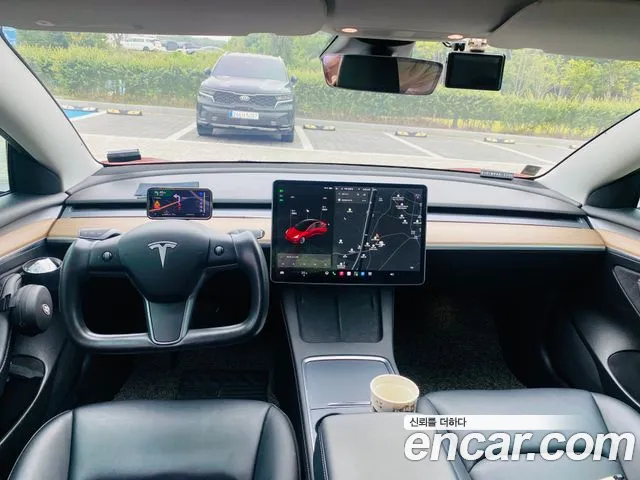 Tesla Model 3 — Фото автомобиля 8