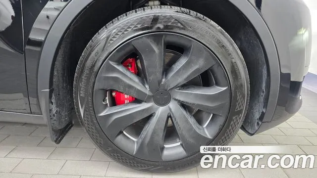 Tesla Model Y — Фото автомобиля 6
