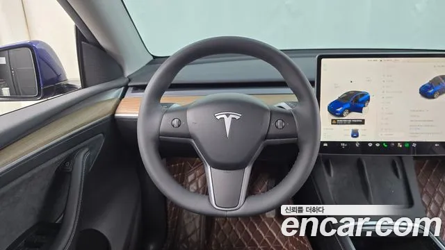 Tesla Model Y — Фото автомобиля 10