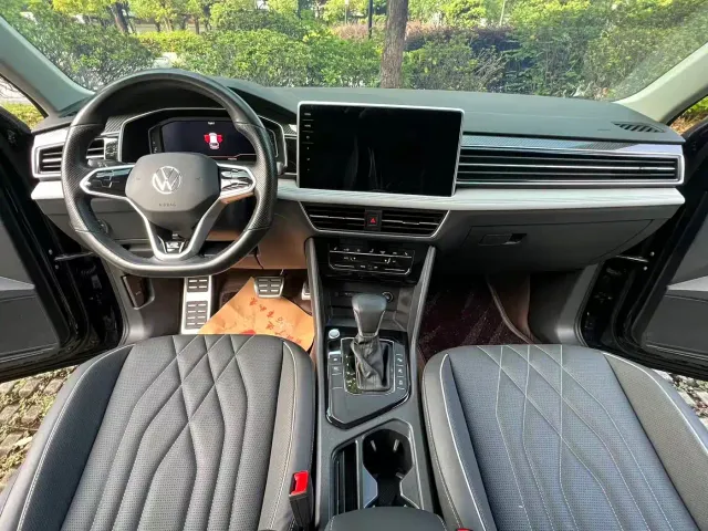 Volkswagen Tiguan L — Фото автомобиля 13