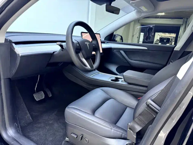 Tesla Model Y — Фото автомобиля 9
