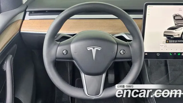 Tesla Model Y — Фото автомобиля 18