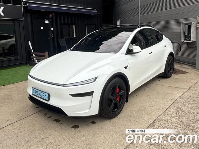 Tesla Model Y — Фото автомобиля 3