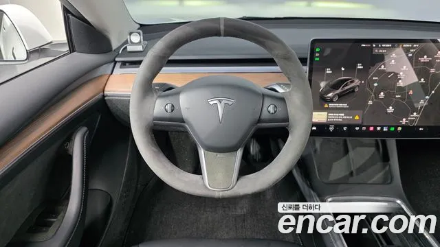 Tesla Model 3 — Фото автомобиля 11