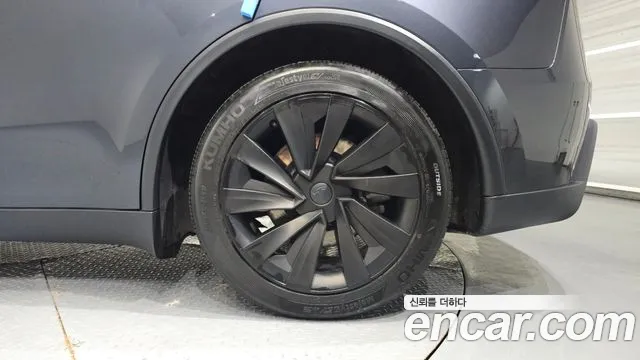 Tesla Model Y — Фото автомобиля 21