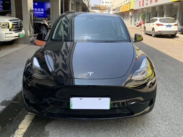 Tesla Model Y — Фото автомобиля 14