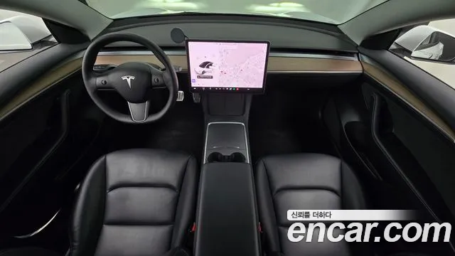 Tesla Model 3 — Фото автомобиля 10