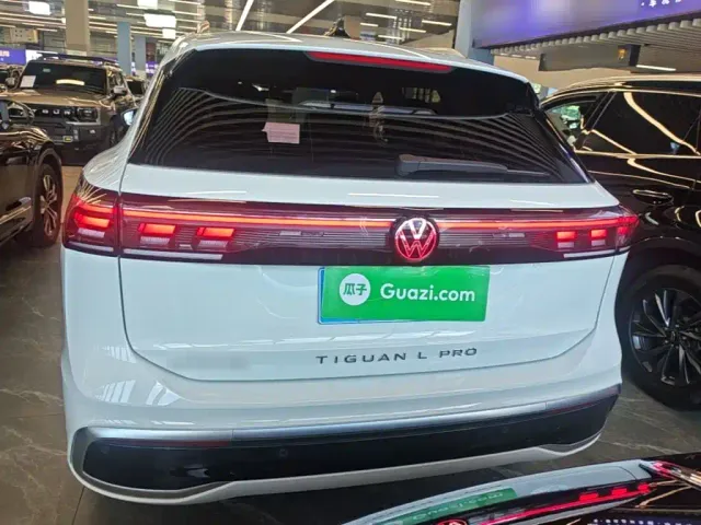 Volkswagen Tiguan L — Фото автомобиля 5