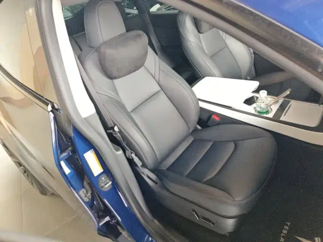 Tesla Model Y — Фото автомобиля 24