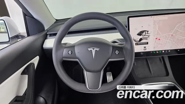 Tesla Model Y — Фото автомобиля 13