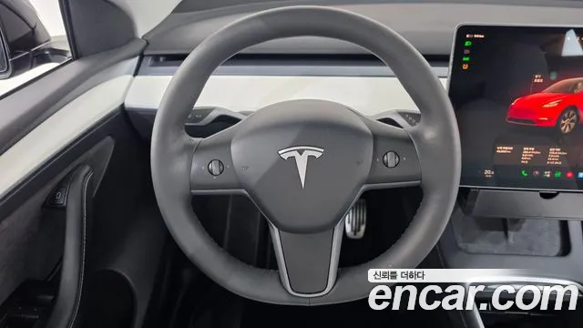 Tesla Model Y — Фото автомобиля 19