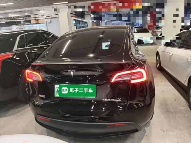 Tesla Model Y — Фото автомобиля 5