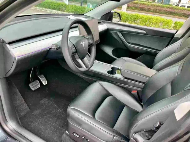 Tesla Model Y — Фото автомобиля 4