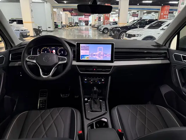 Volkswagen Tiguan L — Фото автомобиля 7