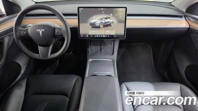 Tesla Model Y — Фото автомобиля 7