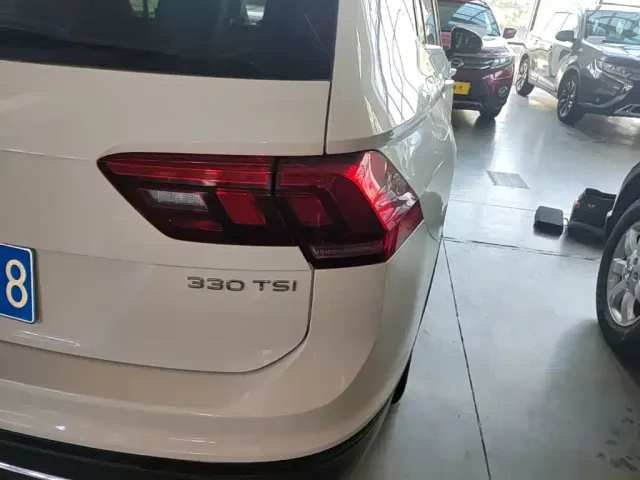 Volkswagen Tiguan L — Фото автомобиля 7