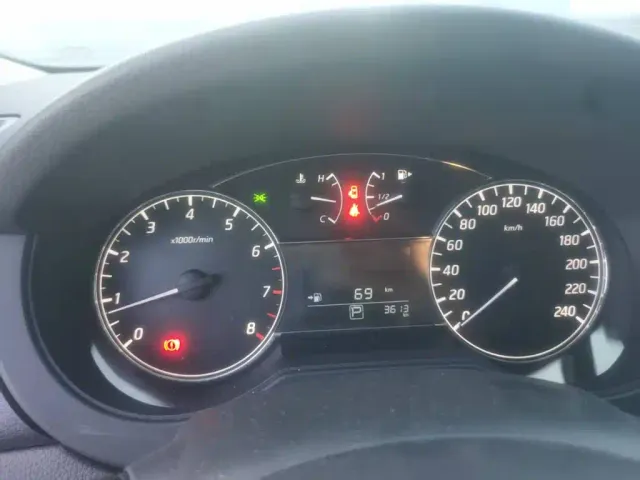 Nissan Tiida — Фото автомобиля 5