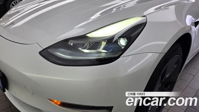 Tesla Model 3 — Фото автомобиля 20