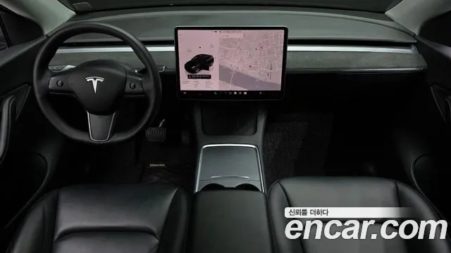 Tesla Model Y — Фото автомобиля 10
