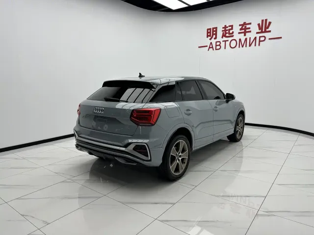 Audi Q2L — Фото автомобиля 9