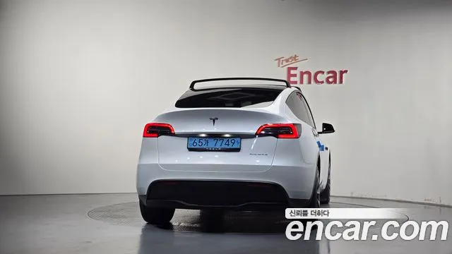 Tesla Model Y — Фото автомобиля 4