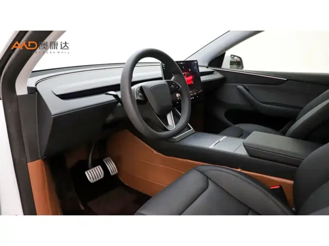 Tesla Model Y — Фото автомобиля 6