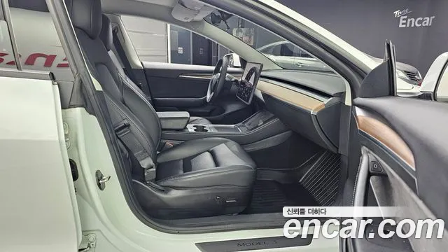 Tesla Model 3 — Фото автомобиля 11