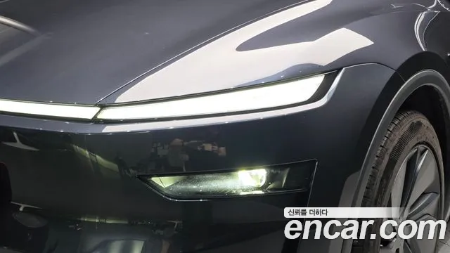 Tesla Model Y — Фото автомобиля 7
