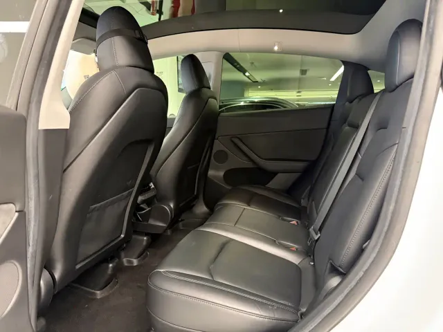 Tesla Model Y — Фото автомобиля 11