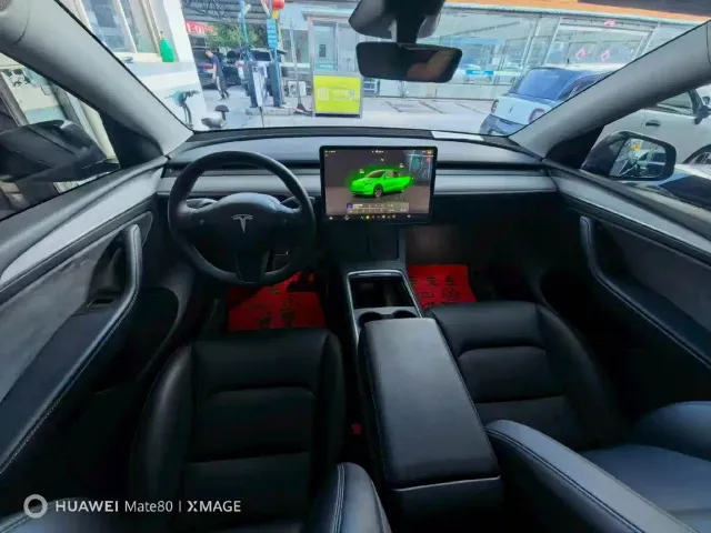 Tesla Model Y — Фото автомобиля 6