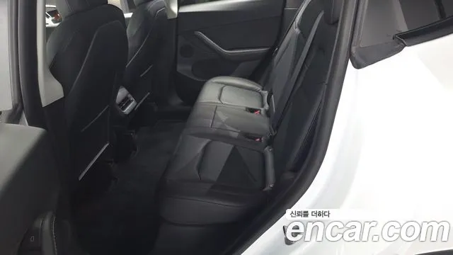 Tesla Model Y — Фото автомобиля 10