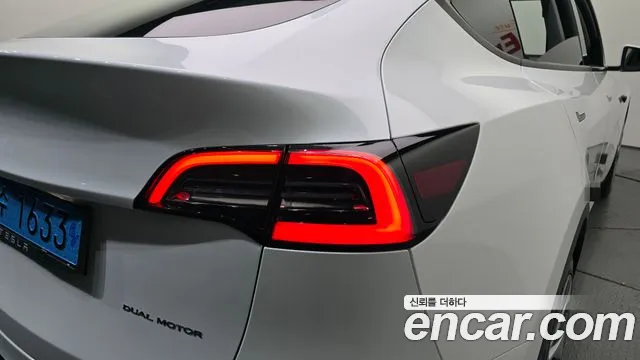 Tesla Model Y — Фото автомобиля 23