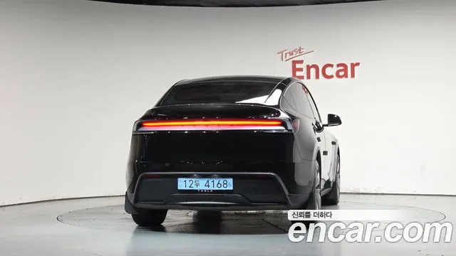 Tesla Model Y — Фото автомобиля 4