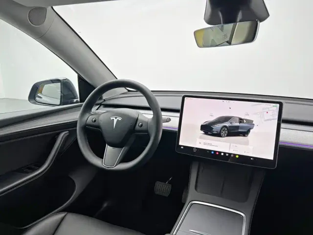 Tesla Model Y — Фото автомобиля 25