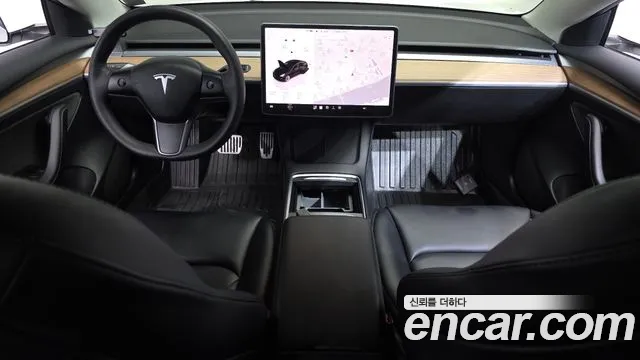 Tesla Model 3 — Фото автомобиля 10