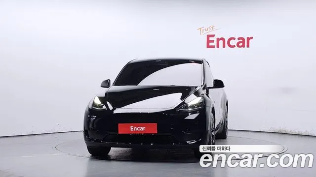 Tesla Model Y — Фото автомобиля 3